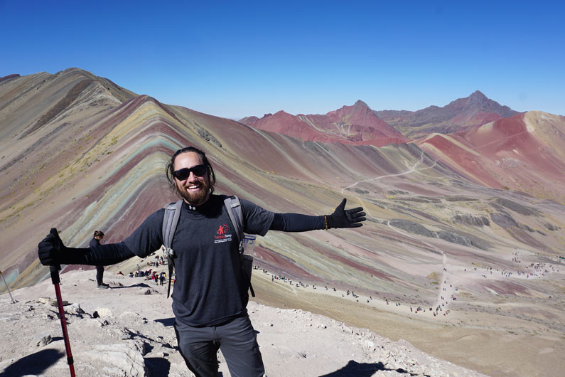 Danny Martinez hiking in the mountains