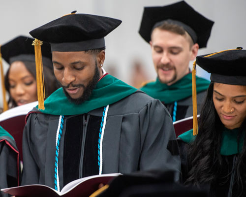 Students in the audience at the PCOM Georgia commencement cereomony