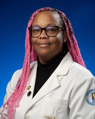 Professional headshot photo of PCOM Georgia PharmD student Seana-Pierre Williams wearing her student physician white coat
