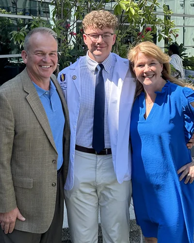 Chandler Allred and his parents