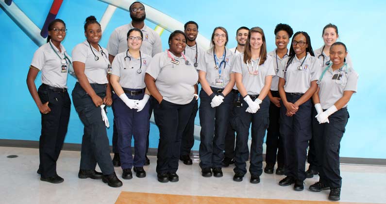 Group photograph of 15 the GA-PCOM biomedical sciences students