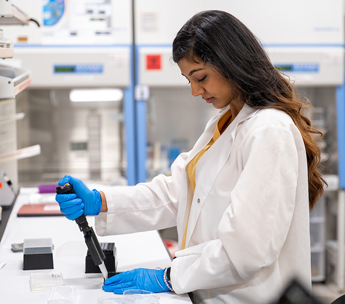 Pharmacy student Krishna Chavada working in a PCOM Georgia research lab