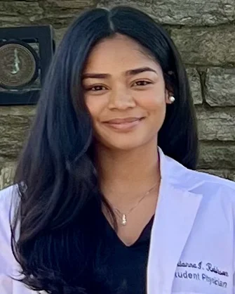 Headshot photo of PCOM med student and researcher Tytianna Robinson (DO '27)