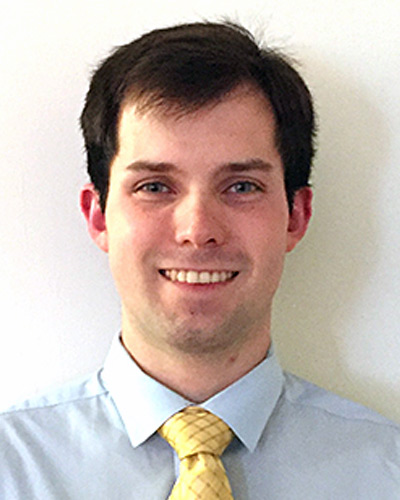 Headshot photograph of PCOM clinical psychology student Nicholas Hope (PsyD '20) wearing a shirt and tie