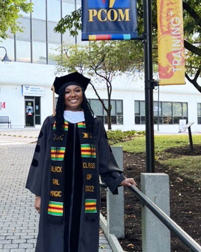 Kristine Smalls, PsydD '22, in graduation regalia