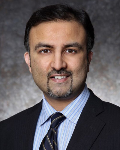 Headshot photograph of DHSA president and CEO Omar Khan, MD, MHS, FAAFP