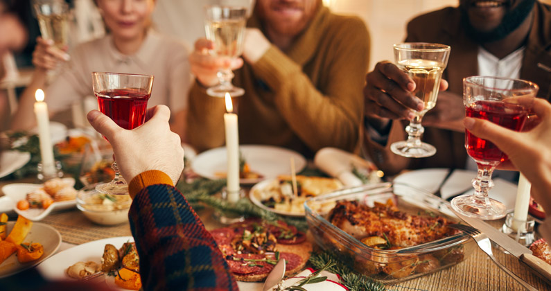 Staying home for the holidays or quarantining after family gatherings are among the holiday safety tips you can follow to keep the PCOM community safe. Following simple holiday safety tips can keep your family safe from covid-19. Pictured is a family gathered for a holiday meal.