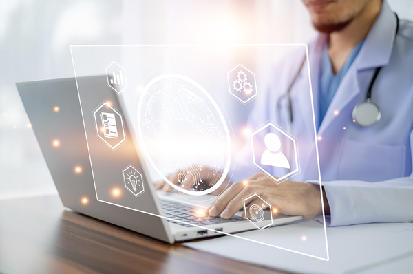 Physician in white coat working on a laptop with an overlay of AI and tech related graphics.