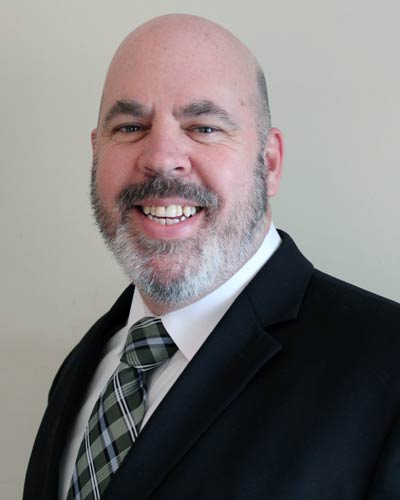 Professional headshot photograph of Richard Smith, MBA