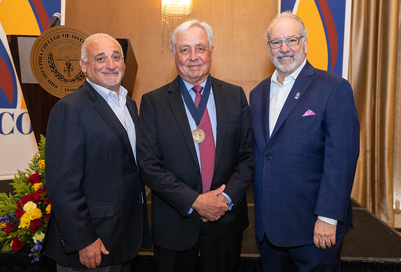 Thomas J. Gravina, Norman Edward Vinn, DO '77, and Jay S. Feldstein, DO '81, pose during PCOM's Founders' Day event