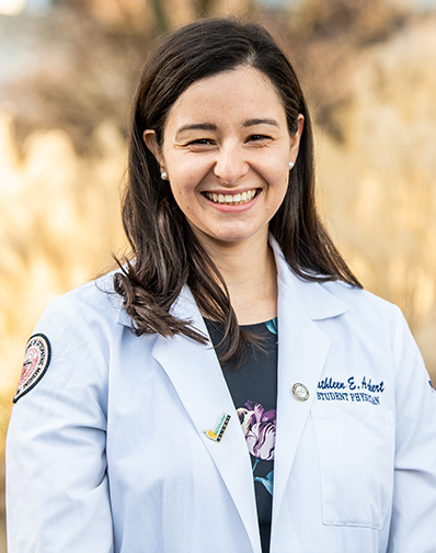 Professional headshot photograph of medical student Kathleen Ackert (DO '20) wearing her white coat.