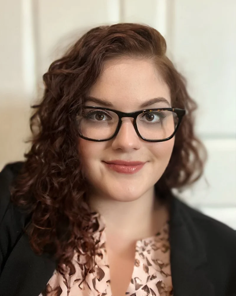 Professional headshot photo of PCOM research coordinator Megan M. Short