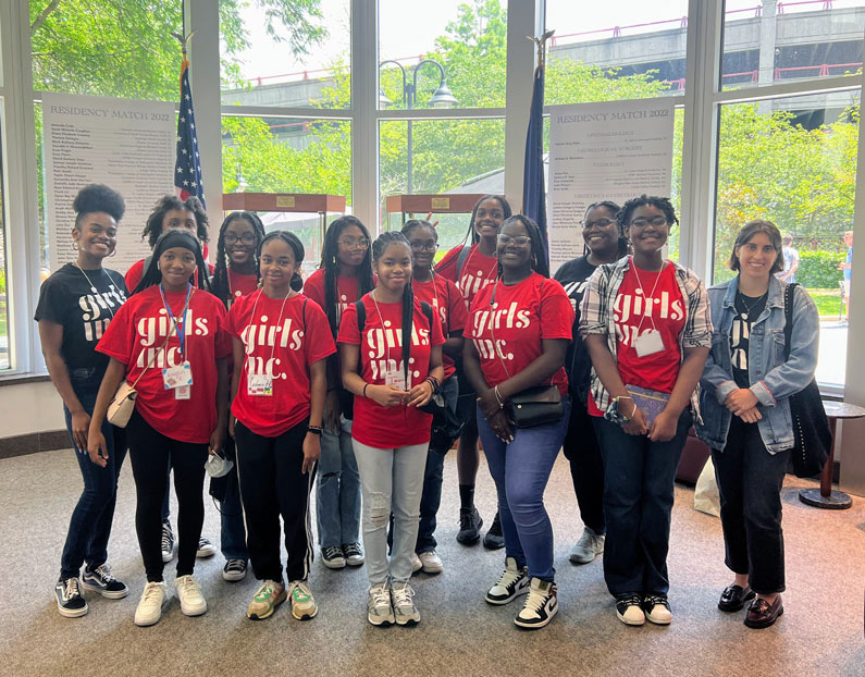 Participants from Girls Inc. Eureka! pose for a group photo