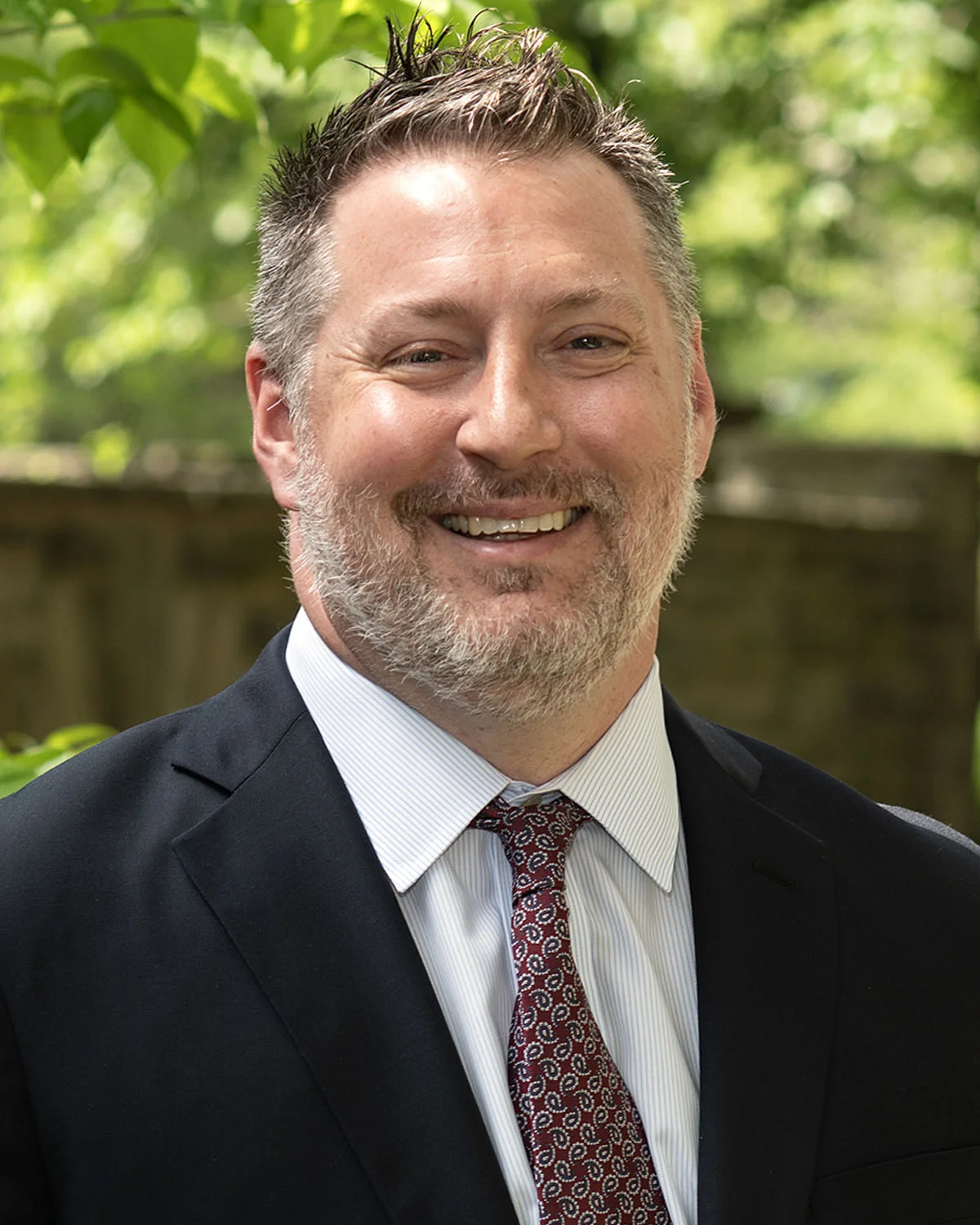 Professional headshot photo of PCOM dean Peter Bidey, DO '08, MSEd, FACOFP