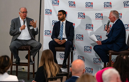 PCOM president Jay Feldstein, DO, speaks in front of an audience alongside two other panel members during the “The Future of Healthcare in Pennsylvania" event