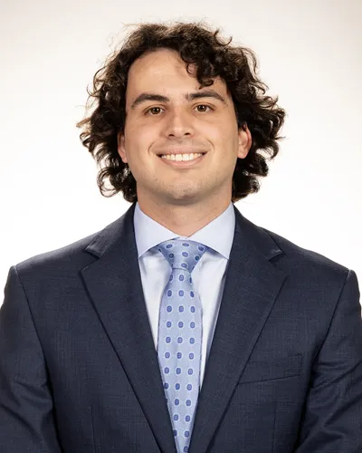 Professional headshot phot of PCOM medical student Liam Gilroy (DO '27)