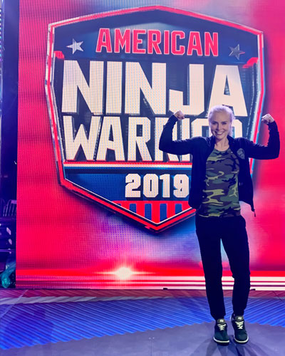 American ninja warrior contestant and medical student Megan Johnson (DO '22) poses at the event