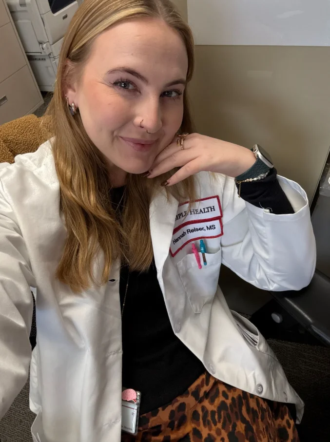 Selfie photograph of PCOM psychology student Hannah Reiser (PsyD '27) in a clinical office