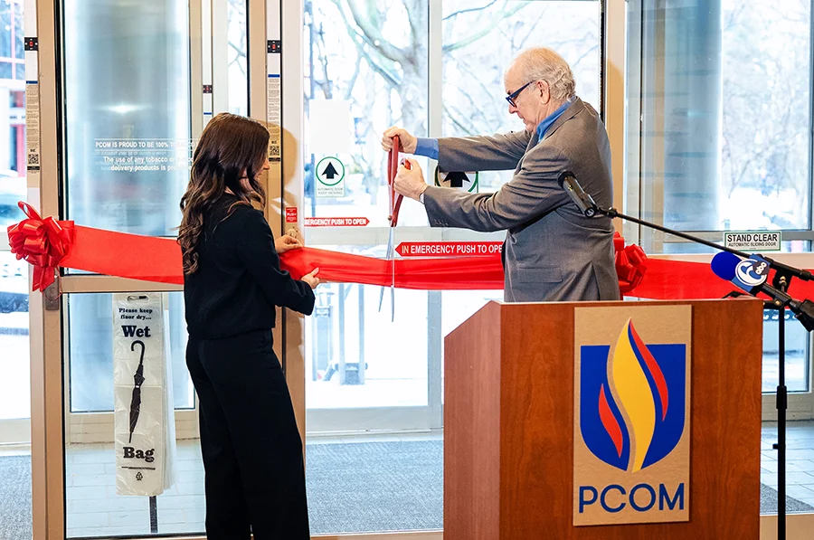 PCOM President Dr. Jay Feldstein and Student Government Association President Paige Schlechter (DO '28) cut the ribbon during the ceremony