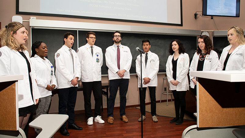 PCOM medical students sing during the body donor memorial ceremony