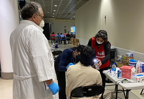 PCOM community members volunteered at Philadelphia International Airport to provide intepretation and intake services for Afghan refugees arriving in the U.S.