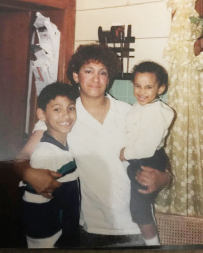 Leslie Fernandez as a child with her mother and late brother
