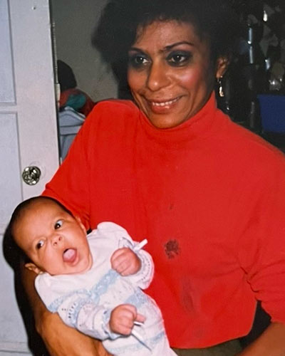 Joyce Daniel Suarez (DO ’26) as a baby with his grandmother