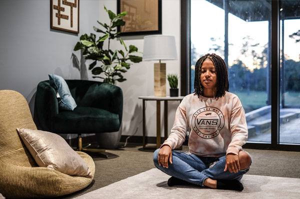 A PCOM South Georgia medical student practices yoga in the relaxation room to combat student stress