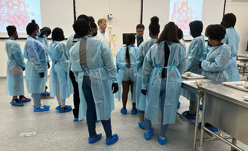 Dougherty County high schoolers wear PPE and learn about human anatomy from PCOM South Georgia professors