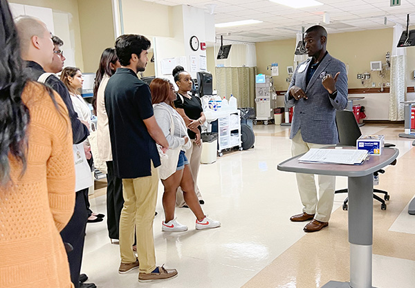 FIRE participants tour Colquitt Regional Medical Center in Moultrie with an experienced physician speaking to them.