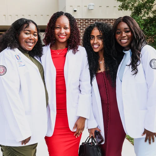 DO students pose together during the white coat ceremony