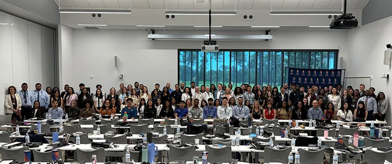 PCOM South Georgia conference room full of new DO student and faculty