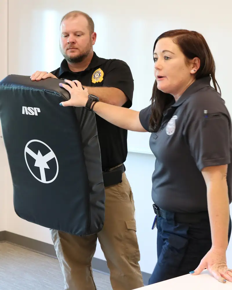 Heidi and Michael Browning discussing self-defense tactics