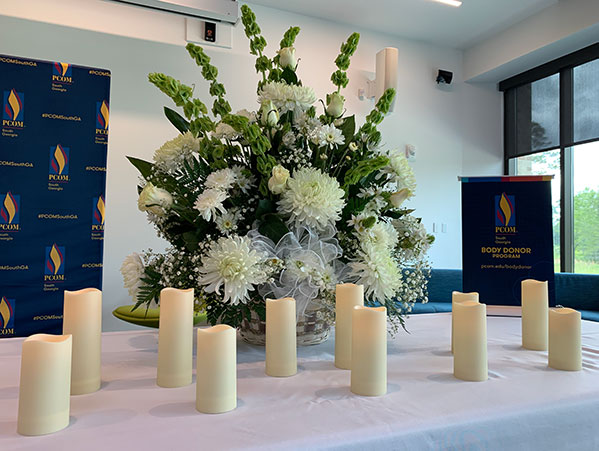 Medical students show appreciation to the anatomical body donors through candles and flowers