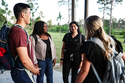 Med students gather on the PCOM South Georgia grounds