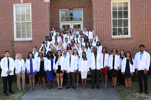 Students Receive White Coats and Words of Wisdom
