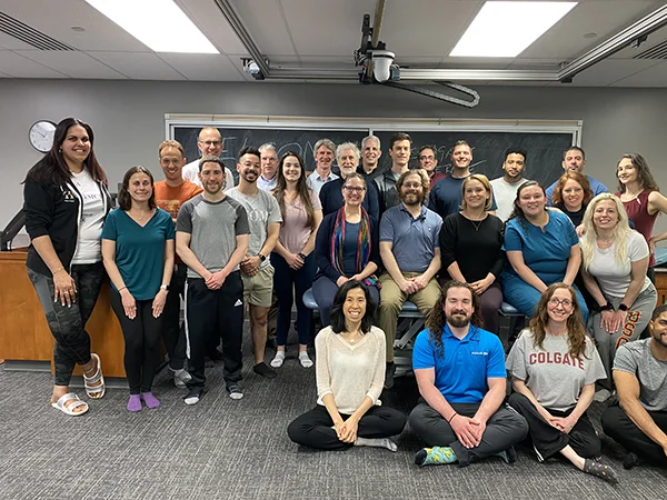 Medical students pose for group photo during OMM CME course