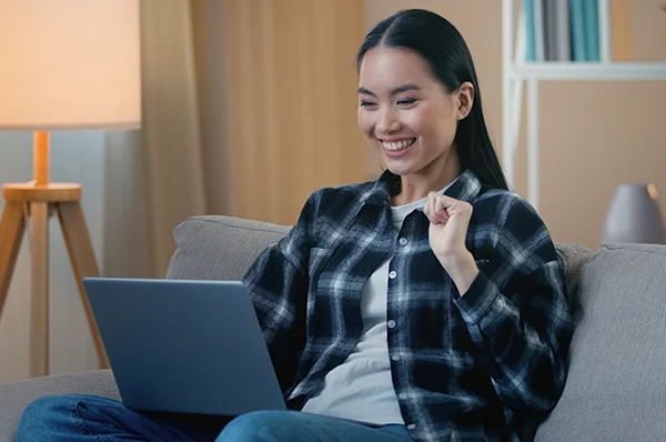 A career changer attends PCOM's mental health counseling virtual information session on a laptop