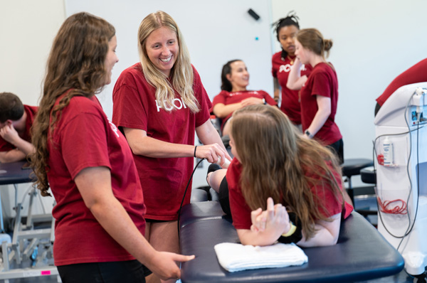 PCOM Georgia physical therapy students participate in hands-on learning exercises.