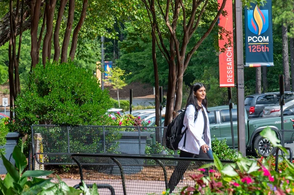 PCOM Georgia DO student walks across campus