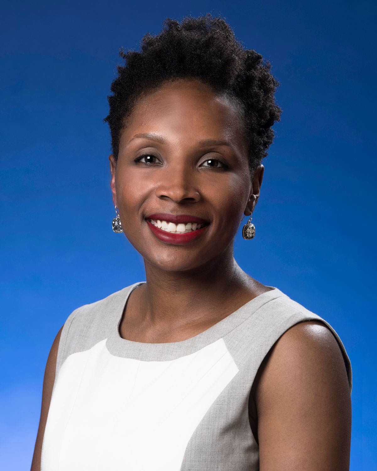 Professional headshot photograph of Aisha DeBerry, JD