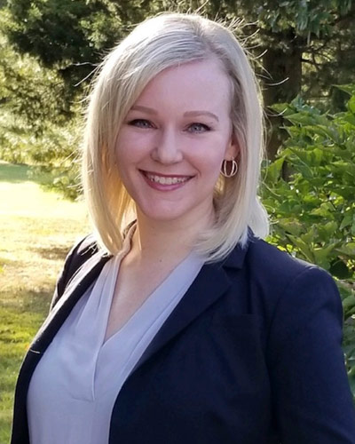 Professional headshot photo of reproductive health psychology specialist and PCOM alum Kristen Hawk-Purcell, PsyD '23, PMH-C