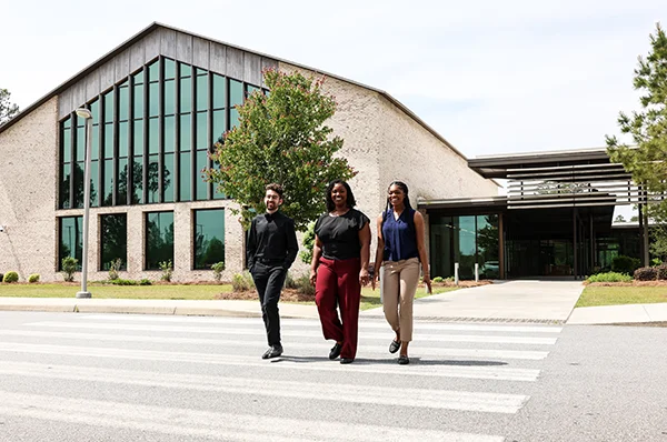 PCOM South Georgia students walking outside toward the parking lot