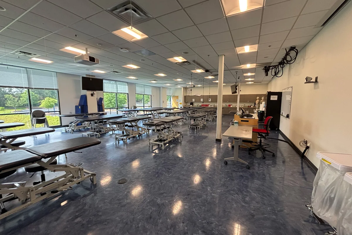 Wide shot of a Physical Therapy classroom with windows facing outside