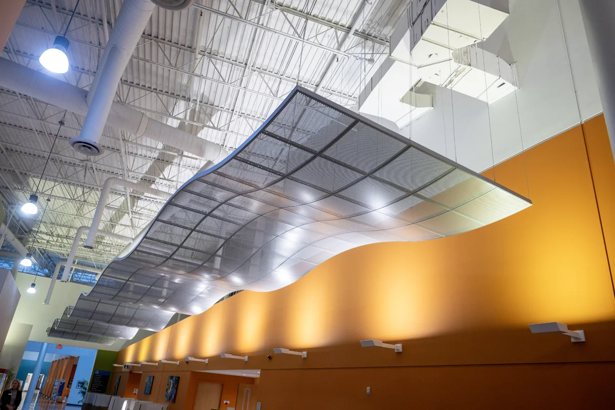 Wide view of the architecture sculptures on the ceiling of PCOM Georgia's main hallway