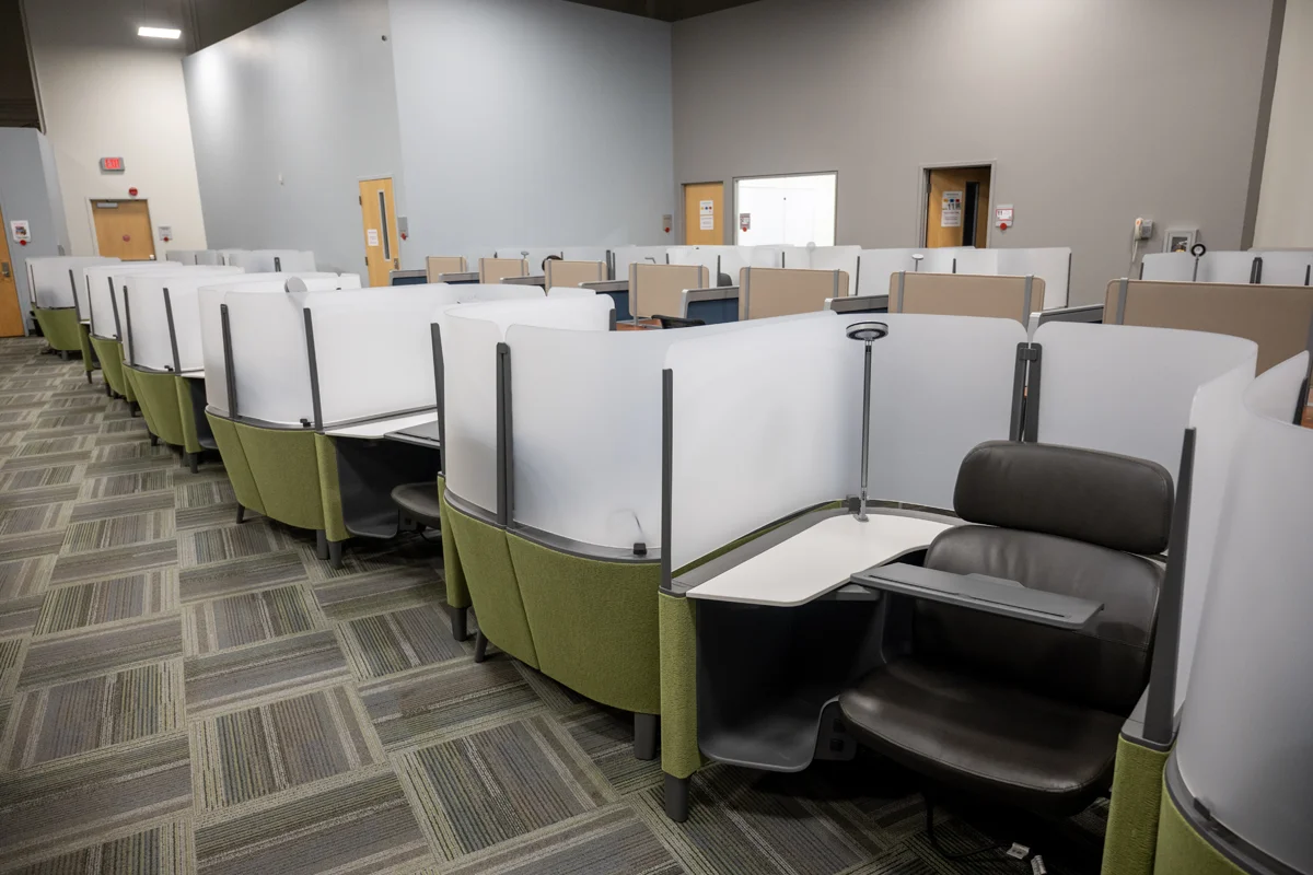 Two rows of study desks in the Information Commons