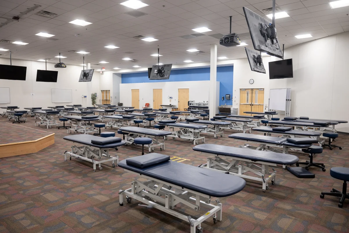 Wide view of the OMM lab and the practice tables