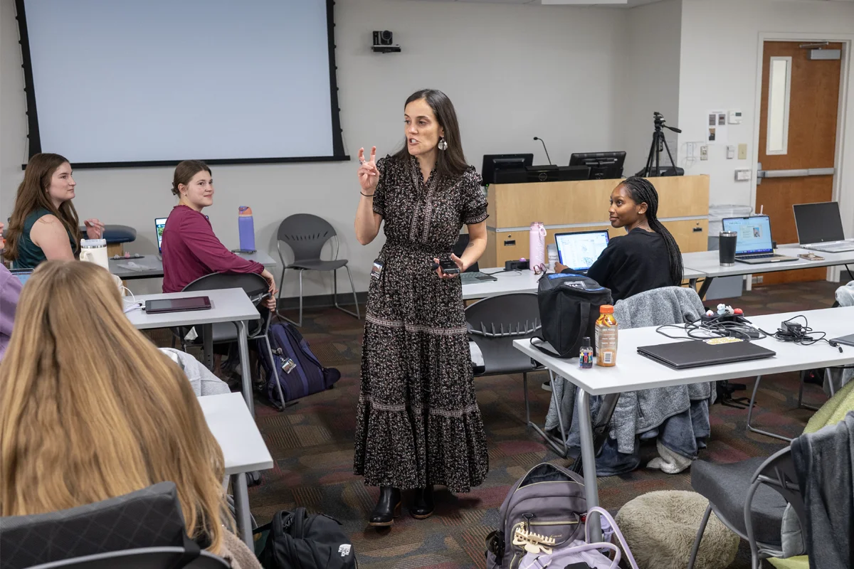 A PA Studies professor lecturing a group of students in the Northlake Building classroom