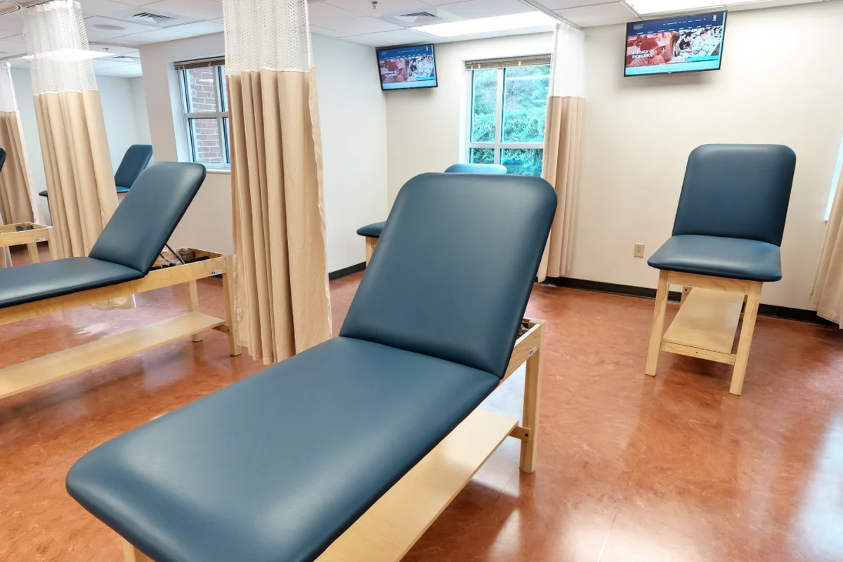 Wide view of the clinical area and exam tables in the PA Studies Suite