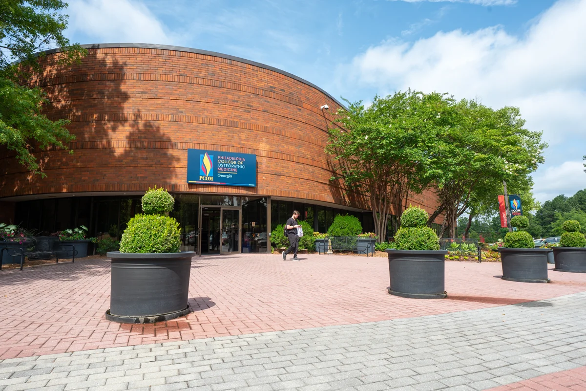 Low shot of the front of PCOM Georgia's main building
